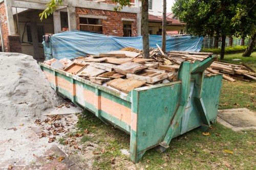 Clearing out old furniture in a Barbican apartment