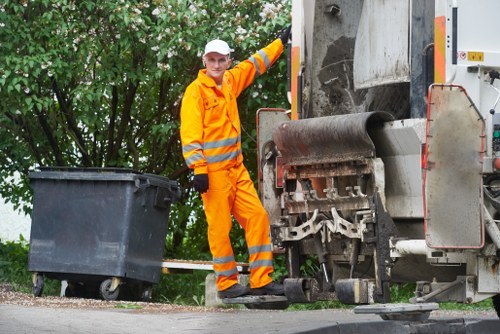 Professional garage clearance team in action